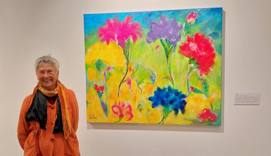 Eva Herre with painting at the Lagos Cultural Center